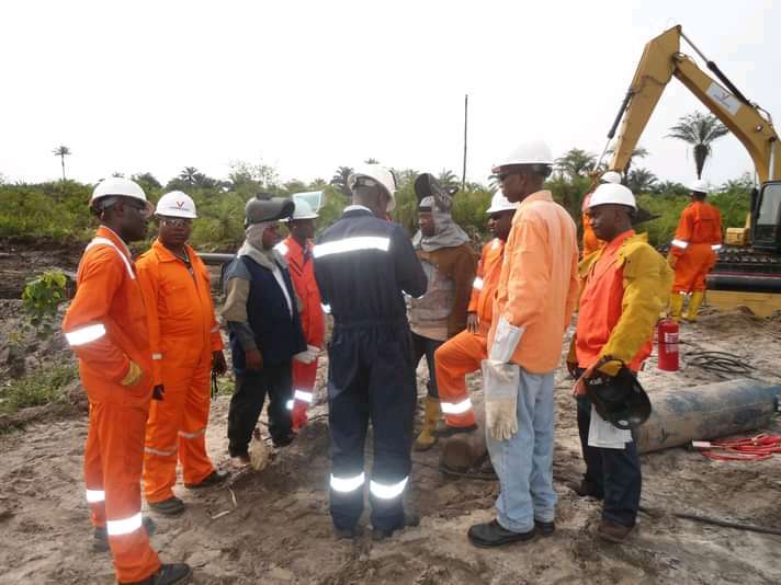 Team of Engineers on the field